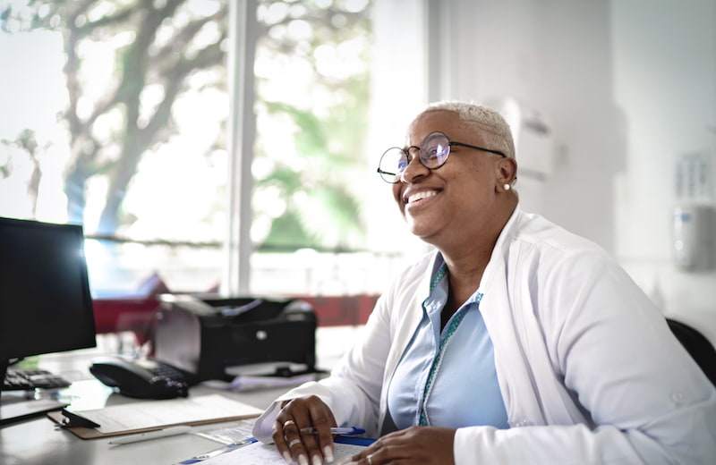 woman wearing glasses while at work