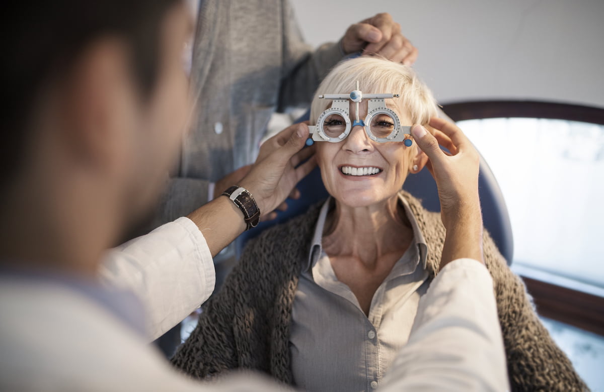 senior woman getting an eye exam